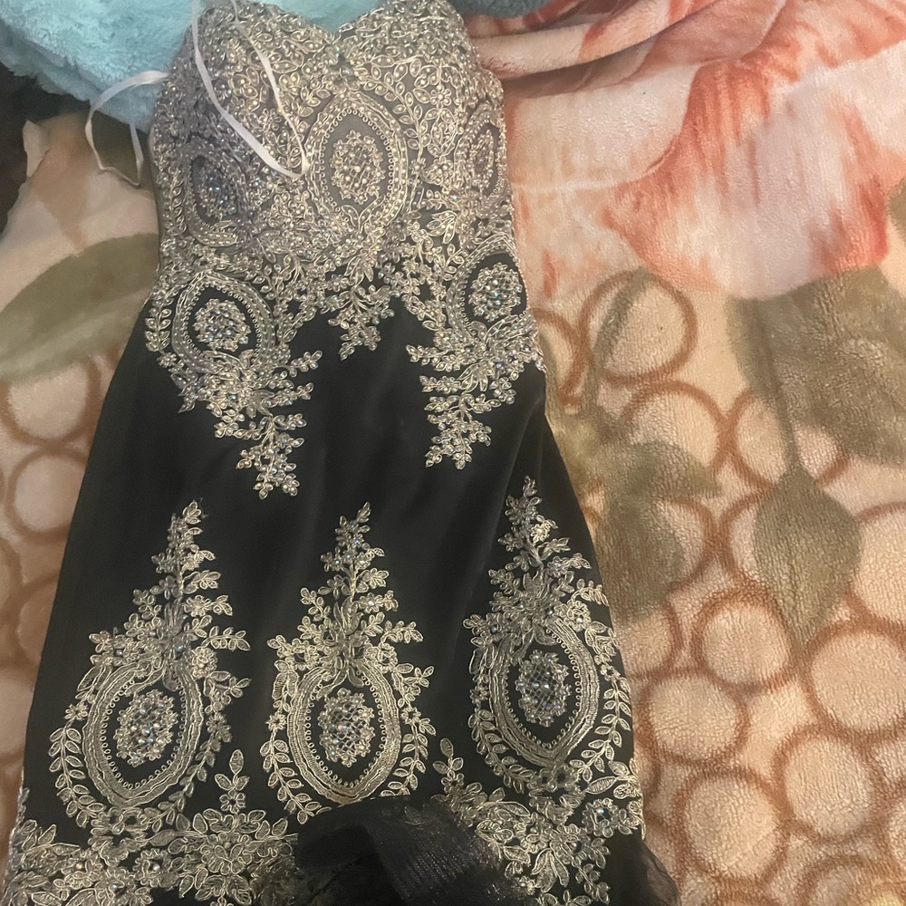 Elegant Black and gold evening gown , prom
Dress